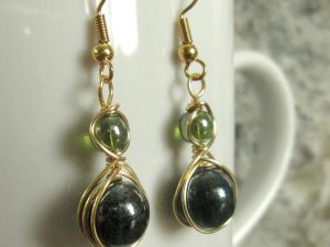 Teal and Green earrings wrapped in gold wire