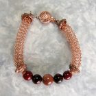 Tarnish Resistant Copper with Red Agate, Red Tiger's Eye and Goldstone Beads, Finished with a Round Filigree Catch