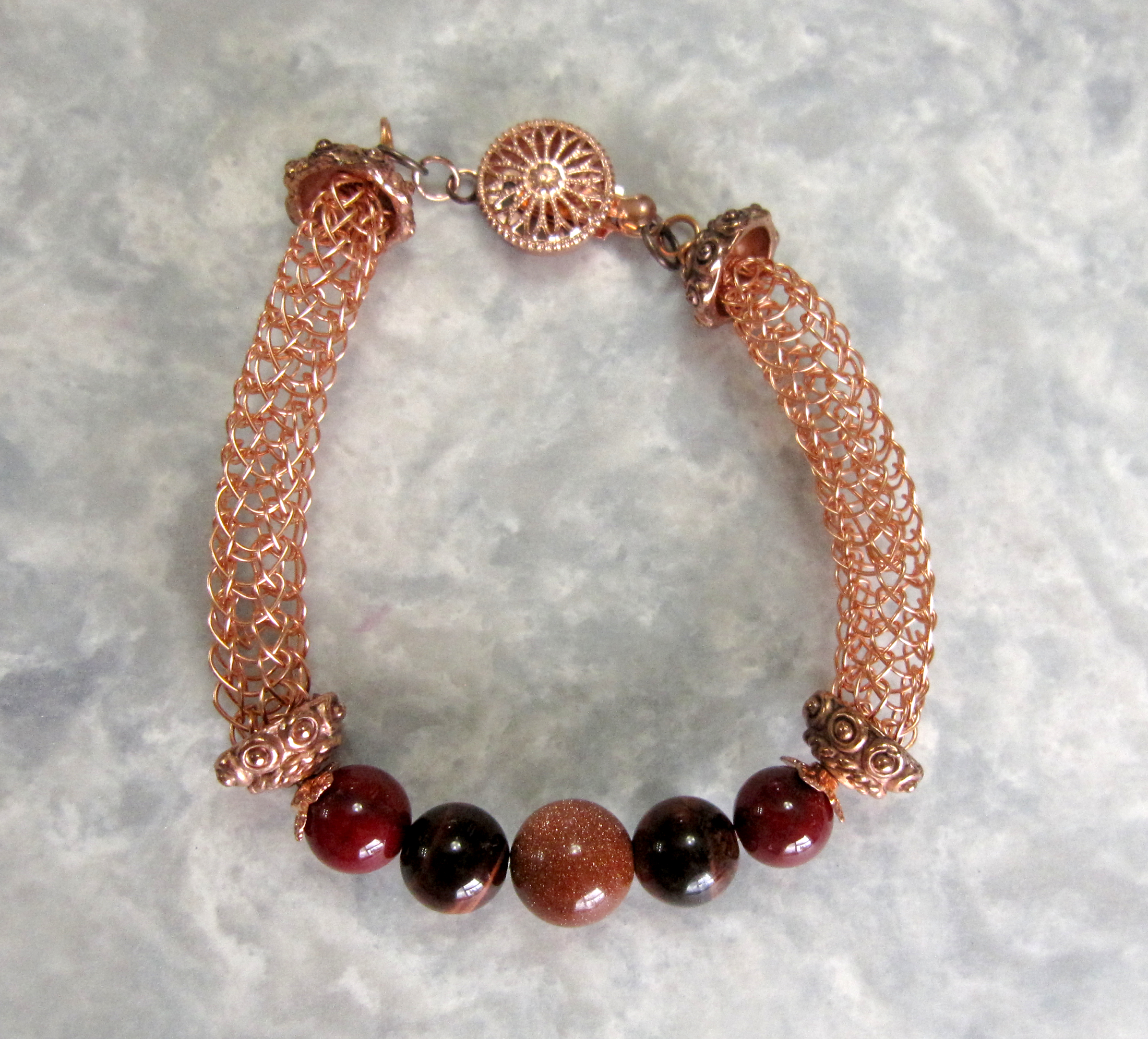 Tarnish Resistant Copper with Red Agate, Red Tiger's Eye and Goldstone Beads, Finished with a Round Filigree Catch