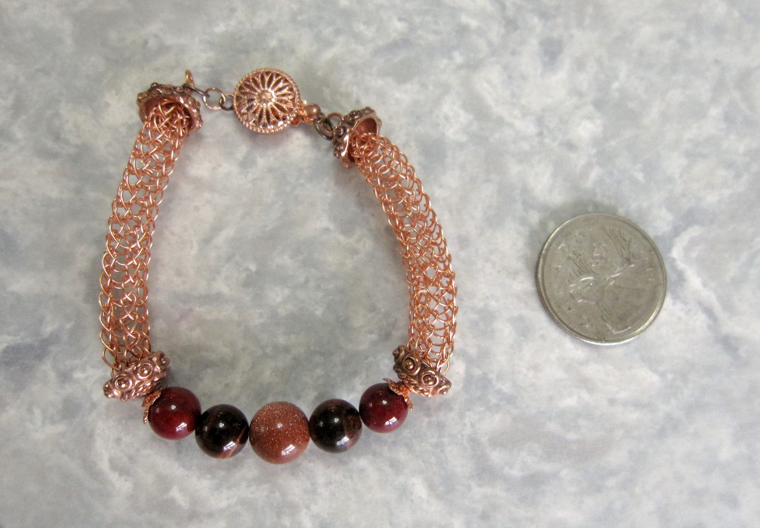 Tarnish Resistant Copper with Red Agate, Red Tiger's Eye and Goldstone Beads, Finished with a Round Filigree Catch