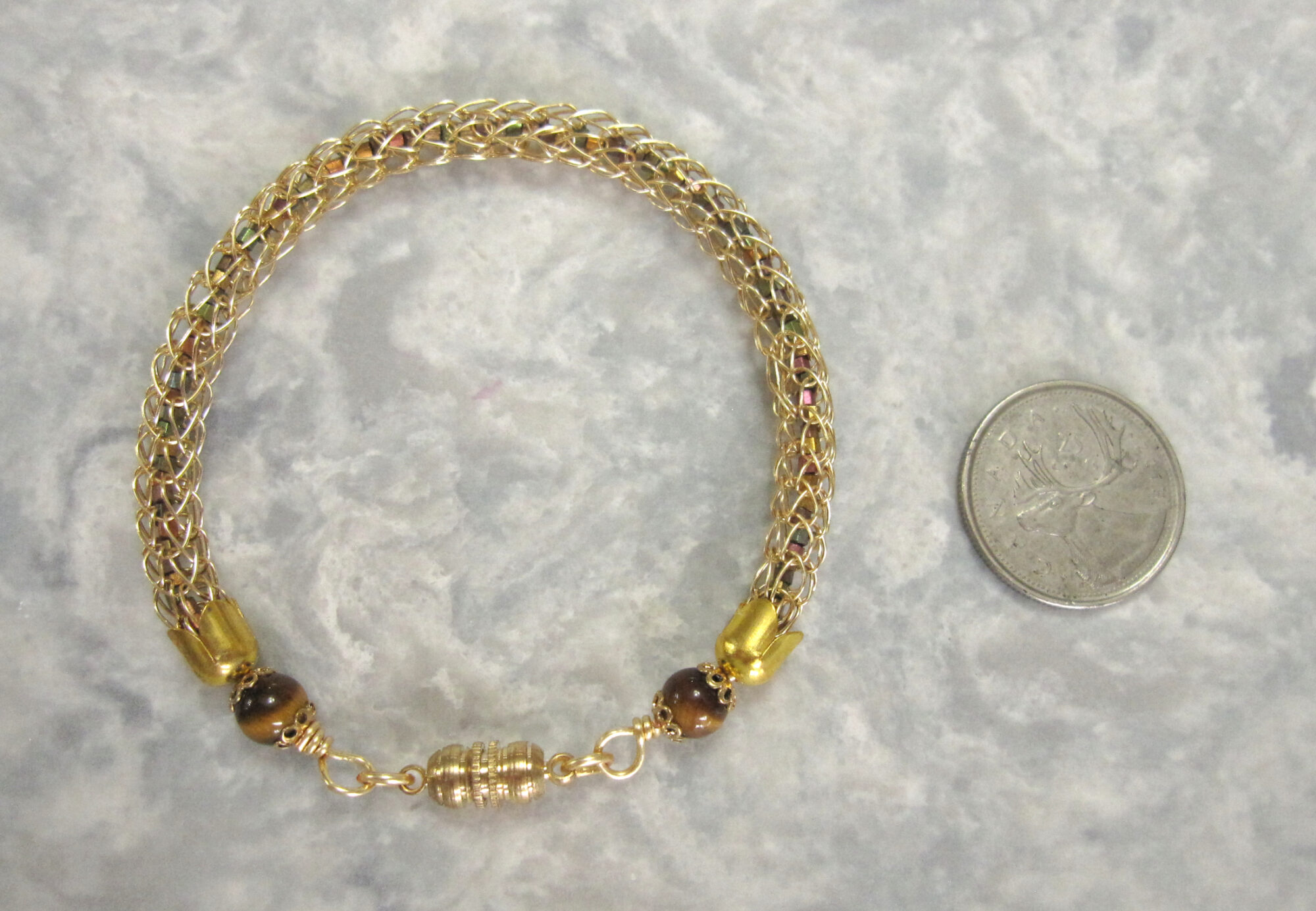 Gold Viking Knit Bracelet Filled With Metallic Seed Beads and Finished with Tiger's Eye Beads and a Magnetic Catch
