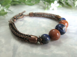 Lapis Lazuli, Sodalite, and Goldstone Beads set in a Double Viking Knit bracelet